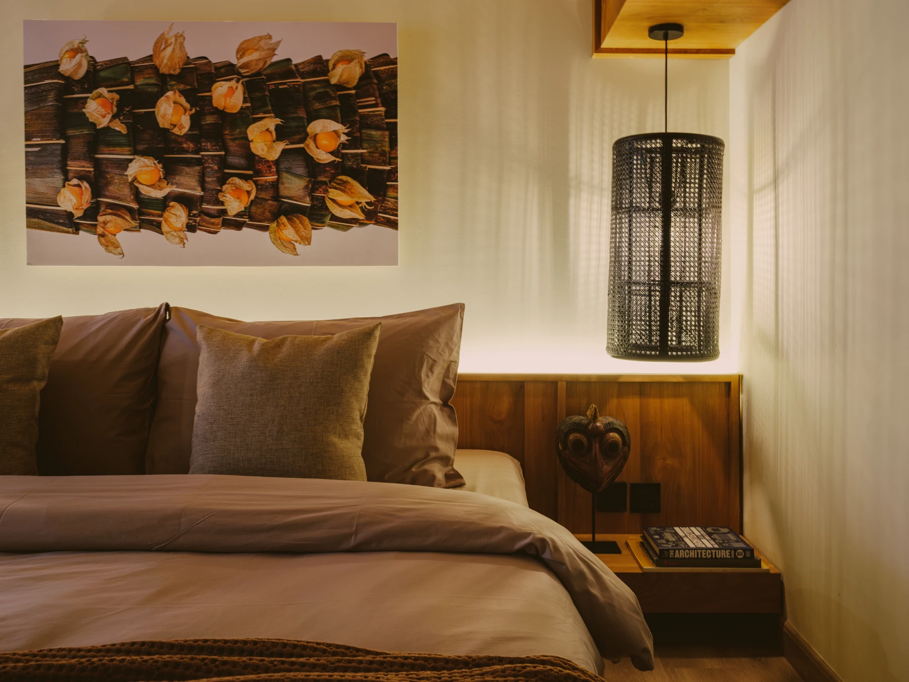 Warm bedroom ambience with artisan woven lighting and traditional Balinese craft