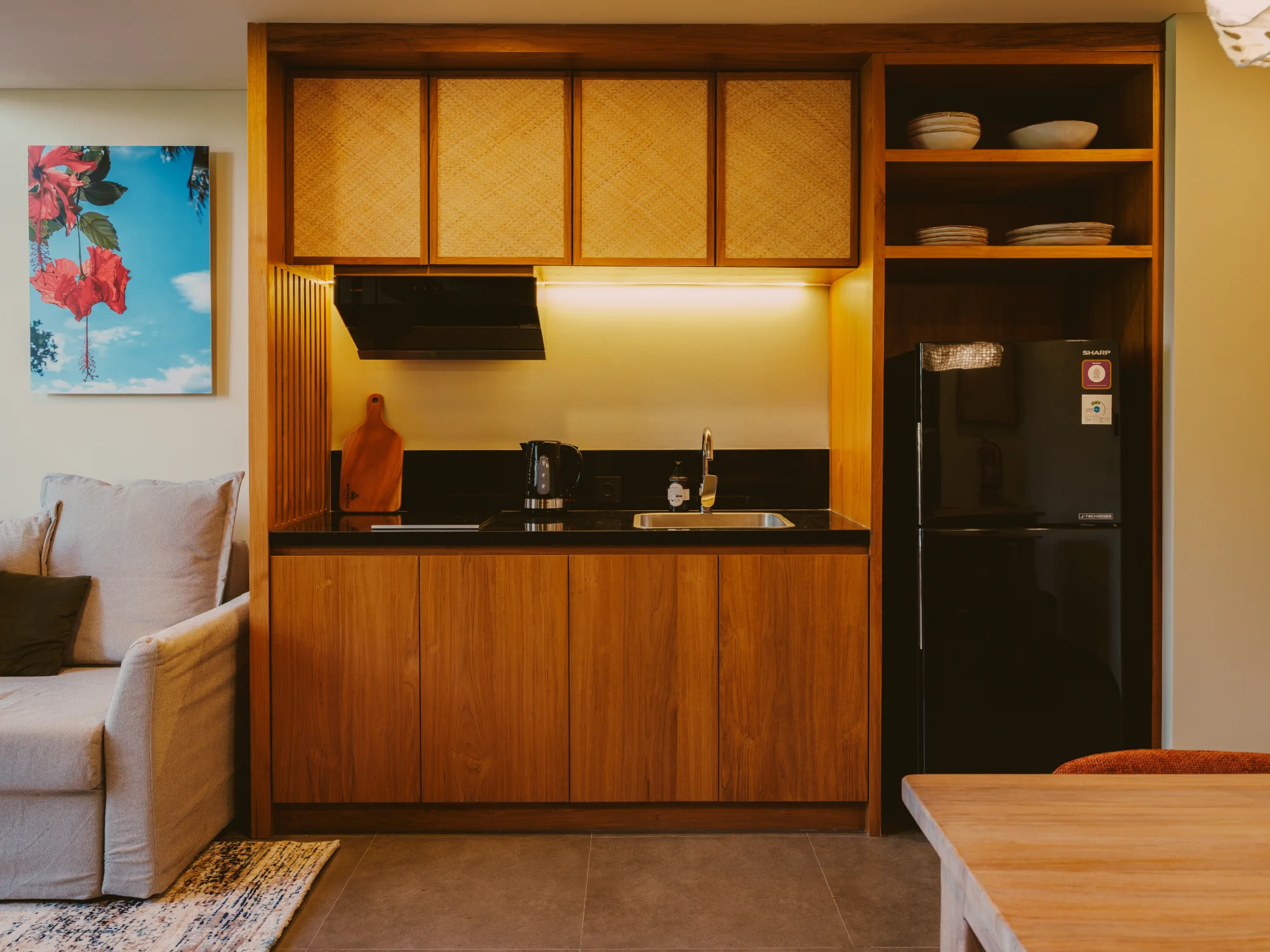 Kitchenette with induction hob, sink, and dining preparation counter