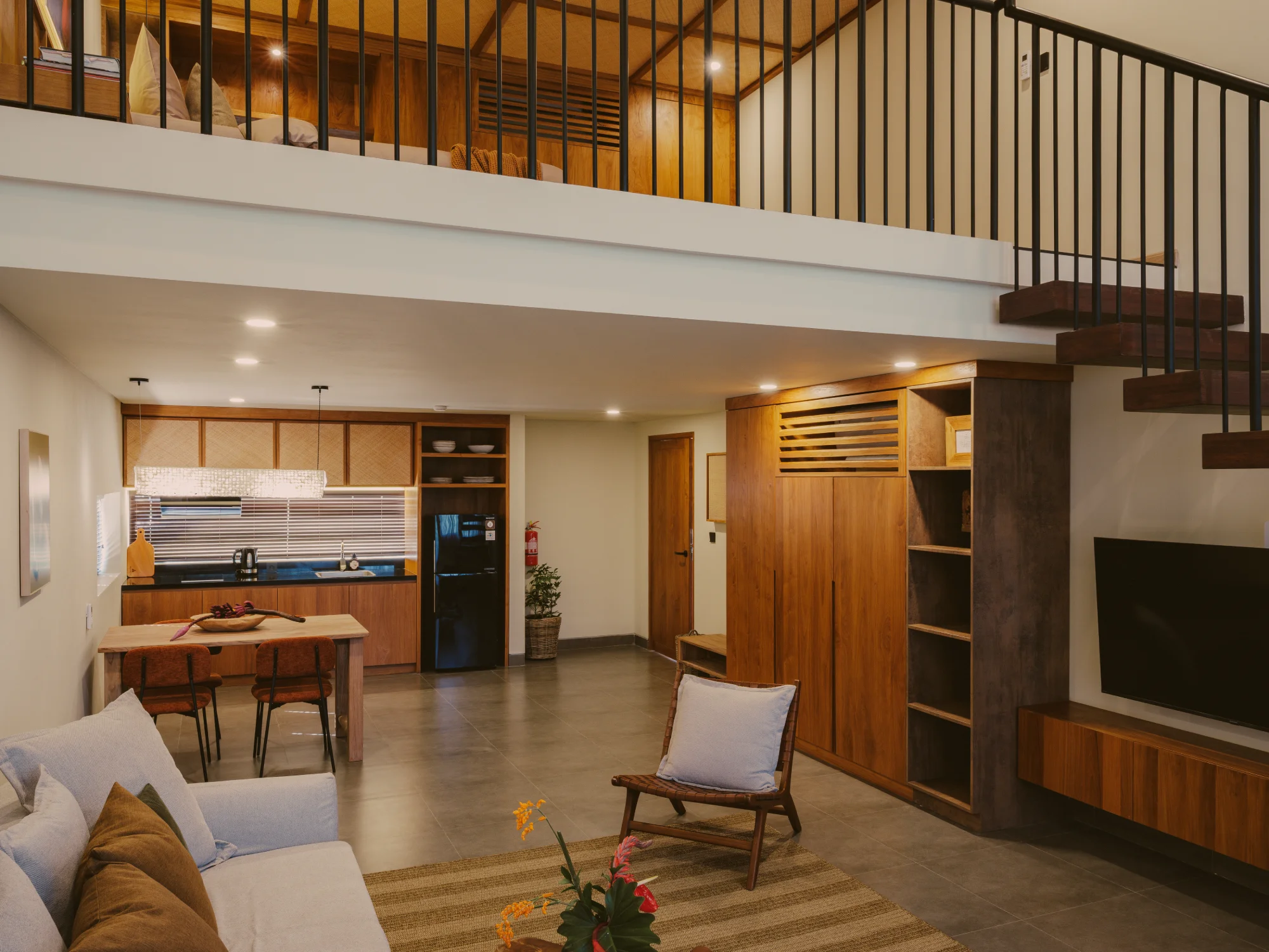 Spacious lower living lounge and seating area in Premium Studio