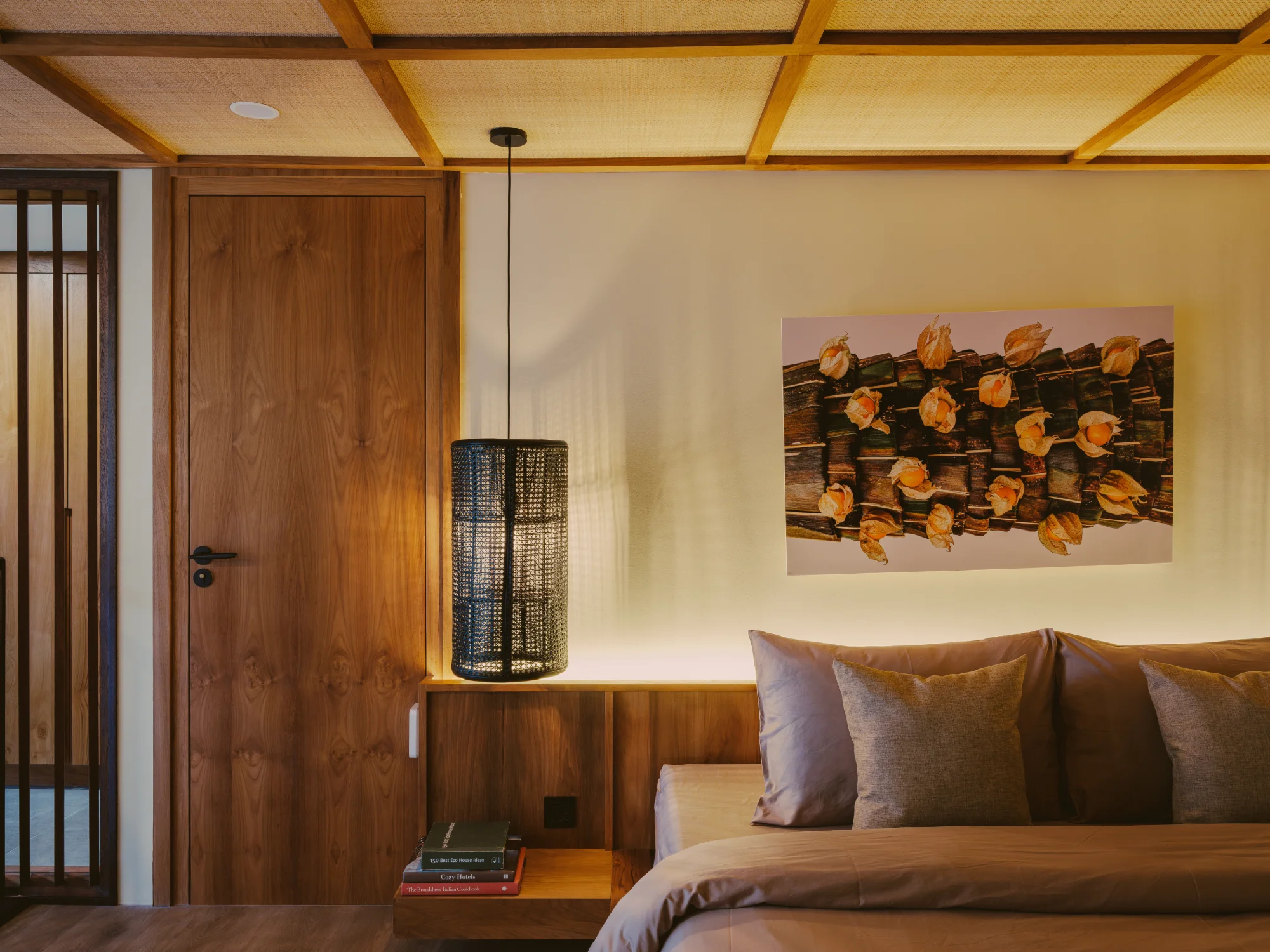 Mezzanine bedroom suite view showcasing high wooden ceiling details